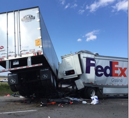 Three people were killed in a collision between two 18-wheelers on I-40 in Lonoke County on April 24, 2018, officials said.