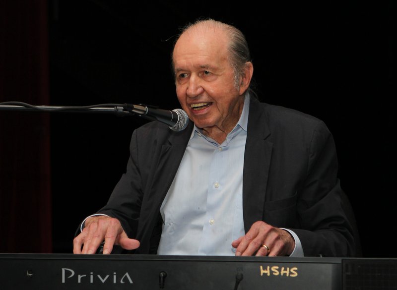 FILE — Schoolhouse Rock composer and music director Bob Dorough plays a song for a group gathered for the Hot Springs Technology Institute opening program at Hot Springs High School in this 2013 file photo. (The Sentinel-Record/Richard Rasmussen)
