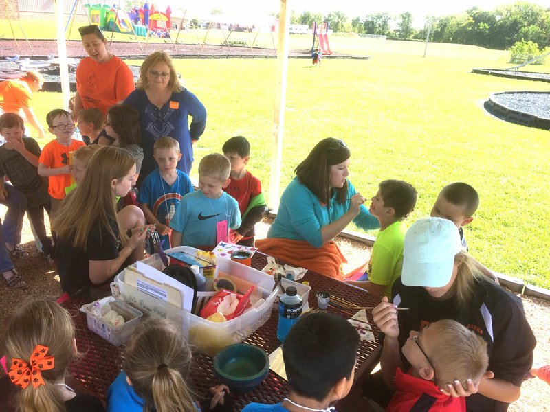 Photo submitted Glenn Duffy "Buddy Day" is an annual event for the elementary students and staff to enjoy a fun-filled day. Face painting, as shown above, on a previous year's Buddy Day is a popular event.