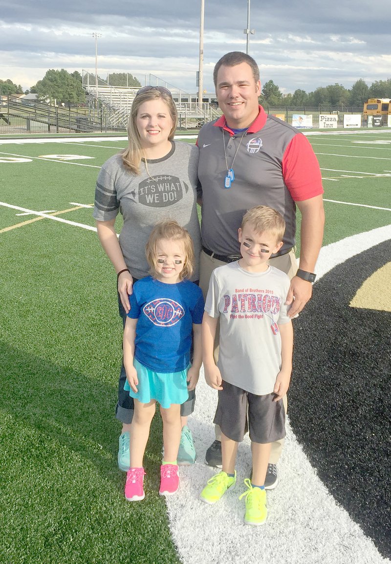 COURTESY PHOTO Jed Davis of Marion will be a new assistant principal at Prairie Grove for the 2018-19 school year. He and his wife, Sarah Catherine, have two children, Anderson, 9, and Emerson, 7.