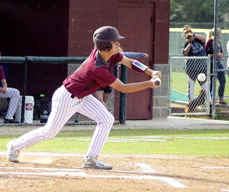 Westside Eagle Observer/RANDY MOLL Gentry's Rowdy Trammell attempts a bunt during play against Life Way Christian on Tuesday, April 17, in the Merrill Reyolds Memorial Complex in Gentry.