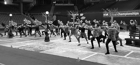 Submitted photo WORLD CHAMPIONS: Members of Lake Hamilton High School Winter Winds perform during the Winter Guard International World Championships Sunday in Dayton, Ohio. The group took the title of World Champions in the Scholastic A Class.