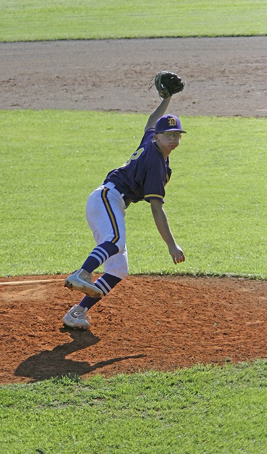 Terrance Armstard/News-Times Junction City's Keelan Hodge finishes throwing a pitch during the Dragons' game against Fordyce in Junction City during the regular season. On Friday, Junction City will take on the winner of today's game between Drew Central and McGehee in the opening round of the 8-3A District Tournament.