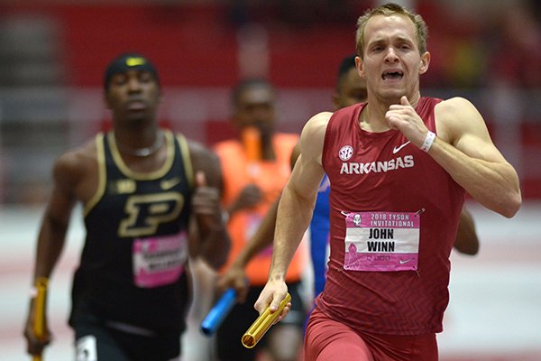 Arkansas' John Winn competes in the 4x400-meter relay Saturday, Feb. 10, 2018, during the Tyson Invitational in the Randal Tyson Track Center in Fayetteville. 