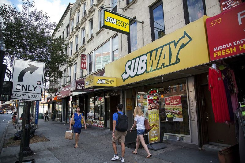 Subway shops, like this one in New York City, are banking on a new loyalty program and menu changes to increase customers at U.S. outlets.  
