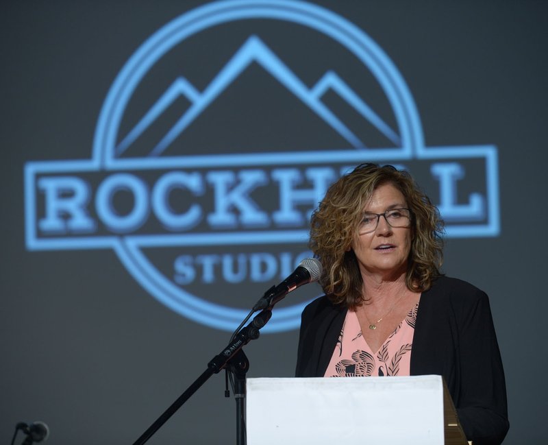 NWA Democrat-Gazette/ANDY SHUPE Kerri Elder, co-founder of Rockhill Studios in Fayetteville, speaks Wednesday during a ribbon cutting for the facility in Fayetteville.