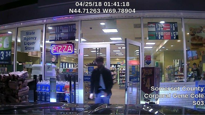 This dash cam photo released by the Maine State Police shows John Williams of Madison, Maine, after robbing a convenience store Wednesday morning, April 25, 2018, in Norridgewock, Maine. Maine authorities are searching for Williams, who they say fatally shot a sheriff's deputy, stole his cruiser and robbed the Cumberland Farms store. 