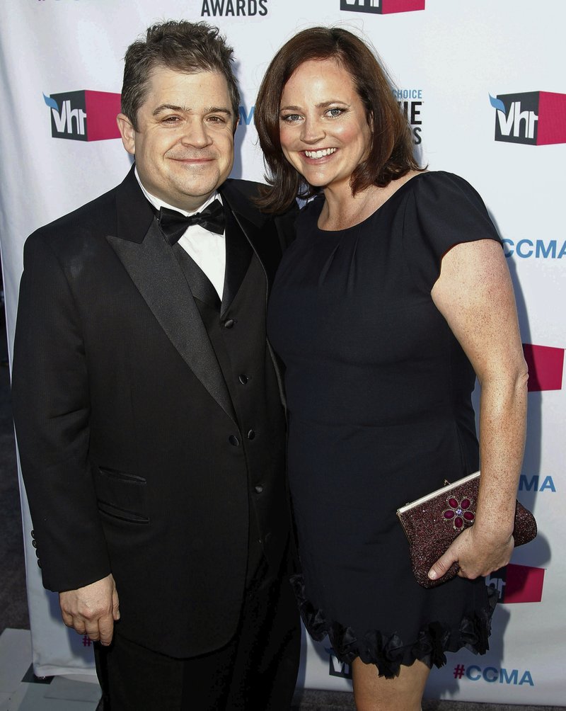 In this Jan. 12, 2012 file photo, comedian Patton Oswalt, left, and his wife Michelle McNamara arrive at the 17th annual Critics' Choice Movie Awards in Los Angeles. Patton Oswalt is crediting his late wife for her work in pursuit of the so-called Golden State Killer. Michelle McNamara had made it her mission to find the person responsible for at least 12 murders and 50 rapes throughout California in the 1970s and 80s. She died in April 2016. On Wednesday, April 25, 2018, authorities said a DNA match led them to arrest Joseph James DeAngelo, a 72-year-old former police officer, as a suspect. 