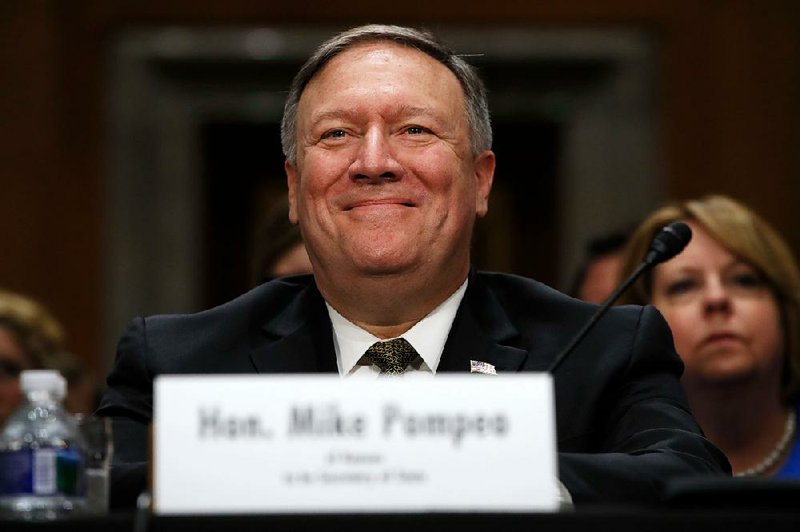 In this April 12, 2018, file photo Mike Pompeo smiles after his introduction before the Senate Foreign Relations Committee during a confirmation for him to become the next Secretary of State on Capitol Hill in Washington. 