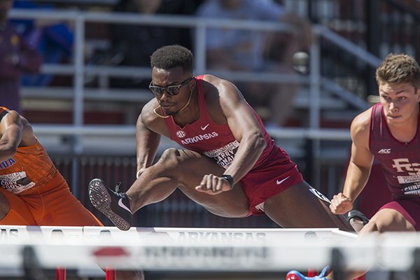 Larry Donald of Arkansas runs in the third heat of the men's 110 meter hurdles Friday, April 27, 2018, during the National Relay Championships at John McDonnell Field in Fayetteville. 