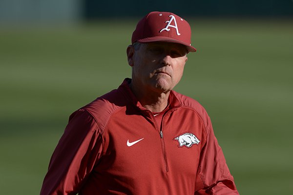 Arkansas coach Dave Van Horn walks to the dugout prior to a game against Alabama on Friday, April 27, 2018, in Fayetteville. 