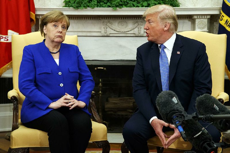 In Trump visit, Merkel echoes Macron on Iran