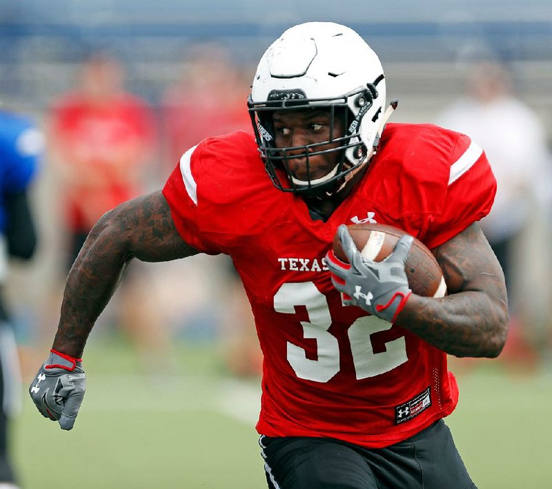 Texas Tech’s Desmond Nisby participates in a spring scrimmage in Midland, Texas. Texas Tech has held at least one workout in Midland for the past six seasons. 