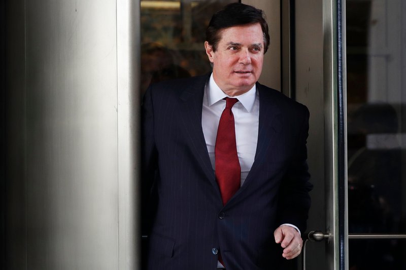 FILE - In this Nov. 6, 2017, file photo, Paul Manafort, President Donald Trump's former campaign chairman, leaves the federal courthouse in Washington. 