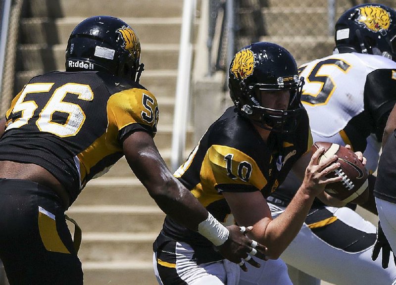 Arkansas-Pine Bluff junior quarterback Shannon Patrick (10), an honorable mention junior college All-American last season at Northland (Minn.) Community College, hit Kolby McNeal for a 62-yard touchdown pass Saturday in UAPB’s spring game. 