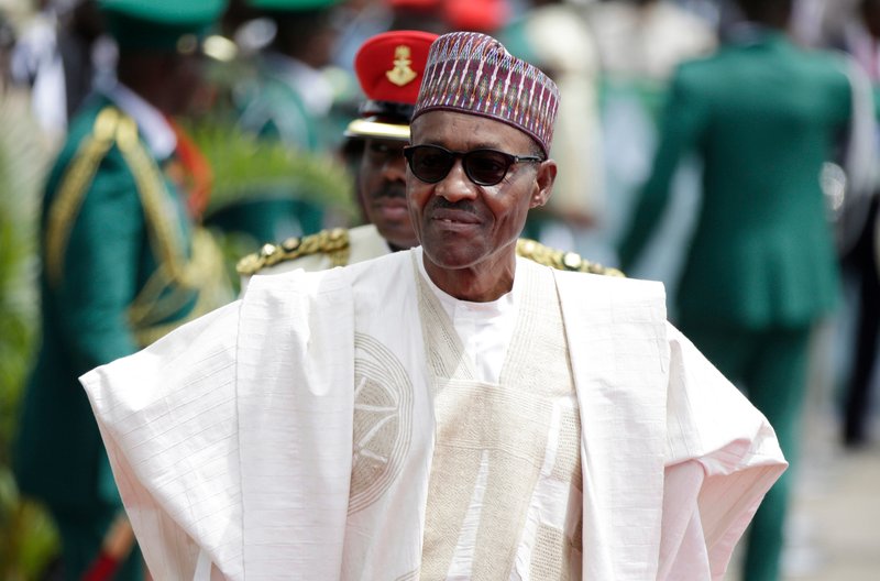 In this Friday, May 29, 2015 file photo, Nigerian President Muhammadu Buhari arrives for his Inauguration at the eagle square in Abuja, Nigeria. After more than a year in office, President Donald Trump for the first time is hosting an African president at the White House. The meeting with Nigerian President Muhammadu Buhari on Monday, April 30, 2018 comes after an uncomfortable start to the Trump administration's approach to the world's second most populous continent. 