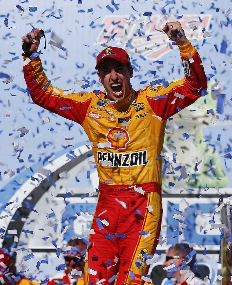Joey Logano celebrates after winning Sunday’s NASCAR Monster Energy Cup series race at Talladega Superspeedway in Talladega, Ala. Logano ended a drought that lasted nearly a year with his last victory coming April 30, 2017. 