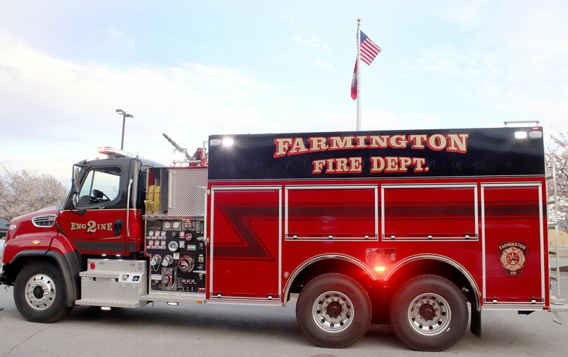 LYNN KUTTER ENTERPRISE-LEADER Farmington Fire Department went for a new bold look with its new 2017 fire engine purchased with money from the Farmington-Prairie Grove Rural Fire Association.