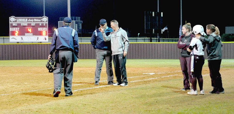 MARK HUMPHREY ENTERPRISE-LEADER/Gentry coach Paul Ernst makes a point to the umpires. Gentry lost 13-7 to Berryville and was eliminated from the District 4A-1 softball tournament at Lincoln last week.