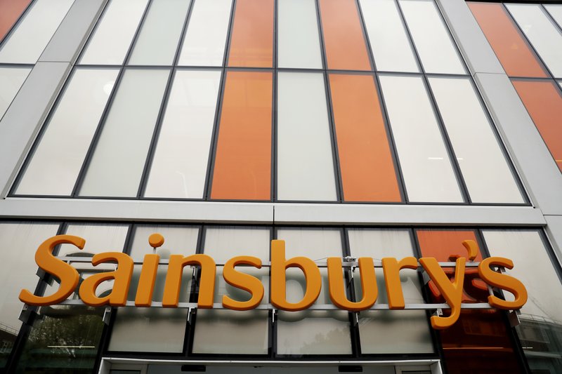 An exterior view of the Sainsbury's flagship store in the Nine Elms area of London, Monday, April 30, 2018. Sainsbury's has agreed to buy Walmart's U.K. unit, Asda, for 7.3 billion pounds ($10.1 billion) in cash and stock in a deal that would create Britain's largest supermarket chain and marks a profound shift in the country's grocery market. (AP Photo/Matt Dunham)