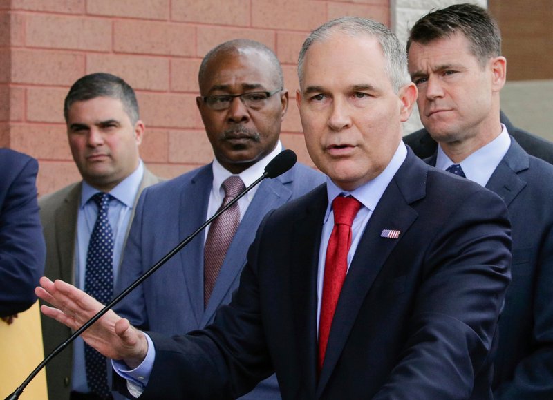 FILE - In this April 19, 2017, file photo, Environmental Protection Agency Administrator Scott Pruitt speaks at a news conference with Pasquale "Nino" Perrotta, left, in East Chicago, Ind. (AP Photo/Teresa Crawford, File)