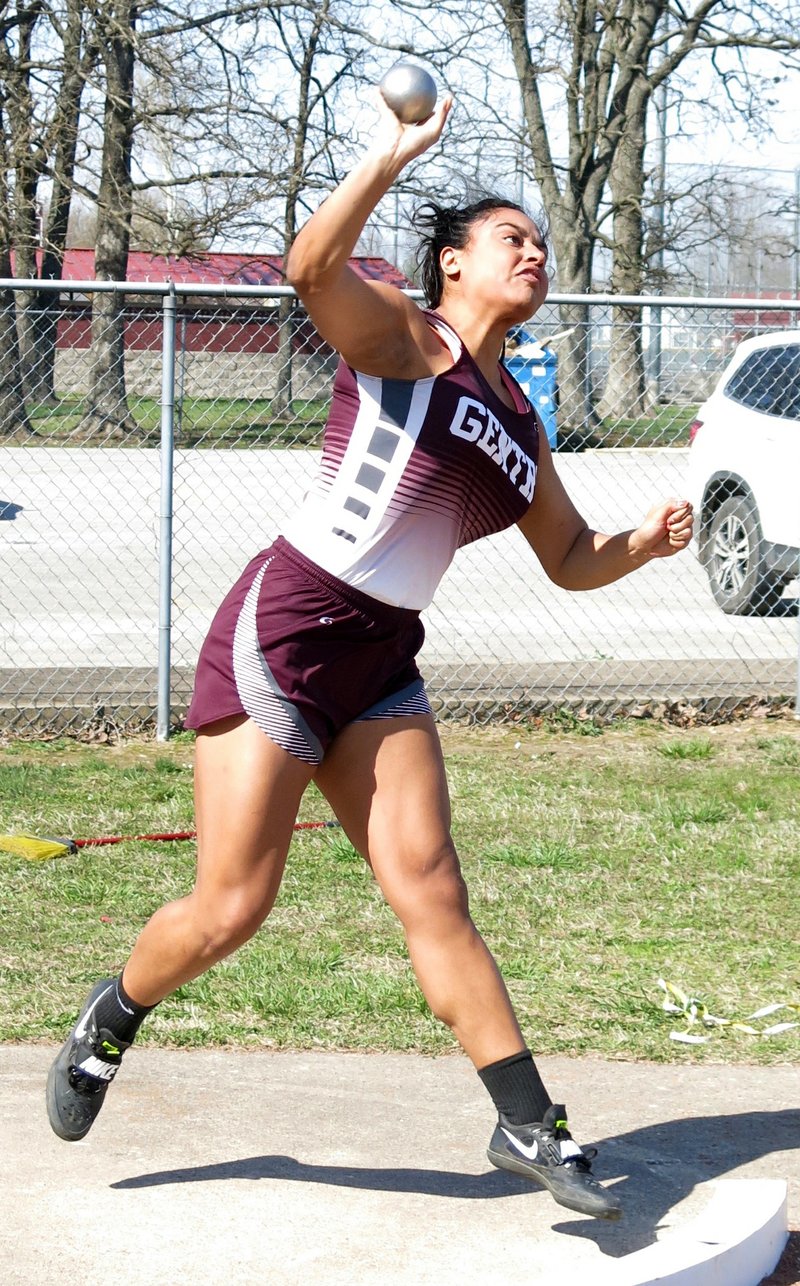 Chastery Fuamatu throws the shot for Gentry during the Pioneer Relays at Gentry High School on April 12, 2018.