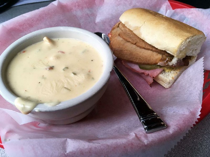 Half an El Cubano sandwich and the soup of the day form a combo at EJ’s.  