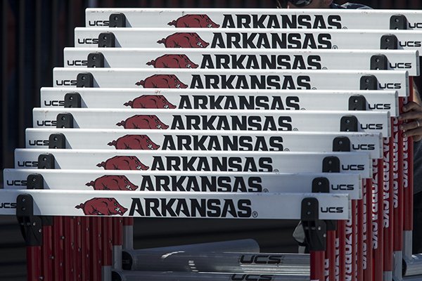 Hurdles are stacked on Friday, April 27, 2018, at John McDonnell Field in Fayetteville. 