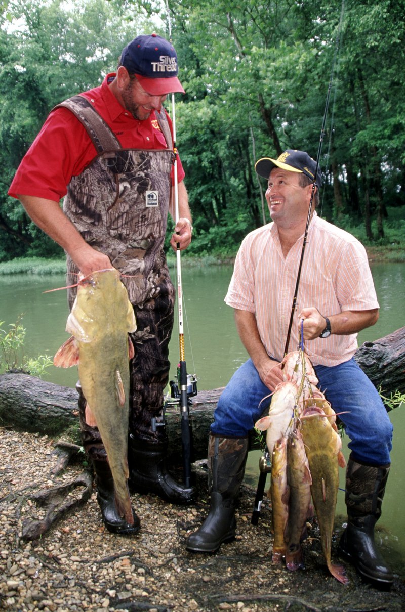 Eating-size cats or trophies? Anglers can take their pick in many of Arkansas’ prime catfishing waters, as Mount Ida anglers Chris Elder, left, and Jimmy Abernathy found out while fishing the Saline River.