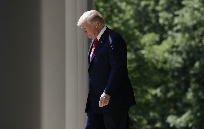 President Donald Trump walks out to speak during a "National Day of Prayer" event in the Rose Garden of the White House, Thursday, May 3, 2018, in Washington. (AP Photo/Evan Vucci)