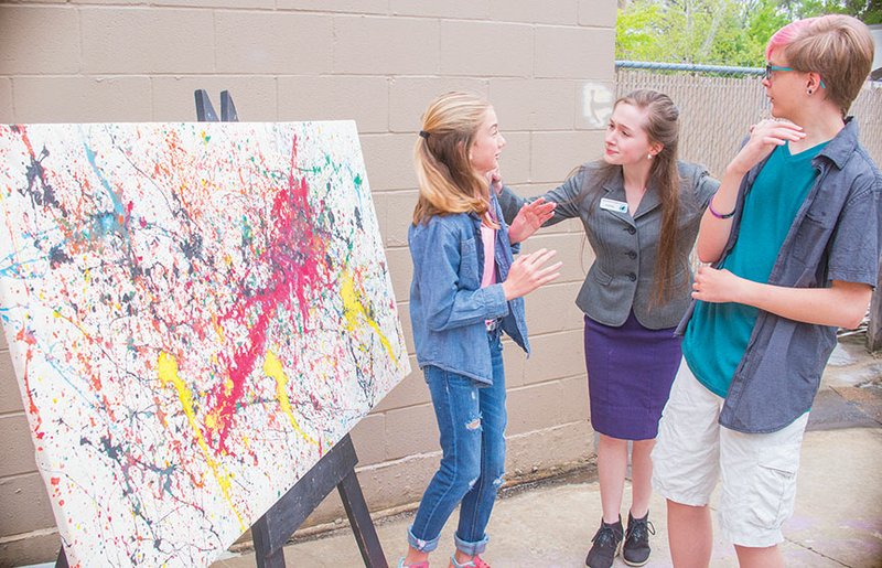 Blackbird Academy of Arts will present Museum Alive on Saturday at the Donald W. Reynolds Performance Hall at the University of Central Arkansas in Conway. In this rehearsal scene, the museum intern, Kaitlyn, center, played by Mikayla Sellers, surprises Mary, left, played by Ava Piraino, and Jackson, played by Avery Steadham, as they look at a painting.