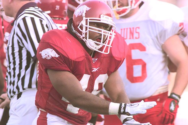 Arkansas linebacker J.J. Jones celebrates after making a tackle during a game against Southwest Louisiana on Saturday, Sept. 5, 1998, in Fayetteville. 