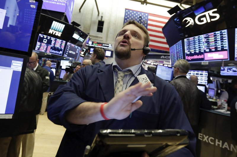 Trader Michael Milano works on the floor of the New York Stock Exchange, Friday, May 4, 2018. Stocks opened moderately lower across the board, putting the market on track for its fourth loss this week. (AP Photo/Richard Drew)