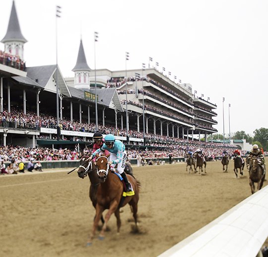 The Associated Press OAKS VICTORY: Jockey Florent Geroux rides to victory in the 144th running of the Kentucky Oaks Friday aboard Monomoy Girl at Churchill Downs in Louisville, Ky.