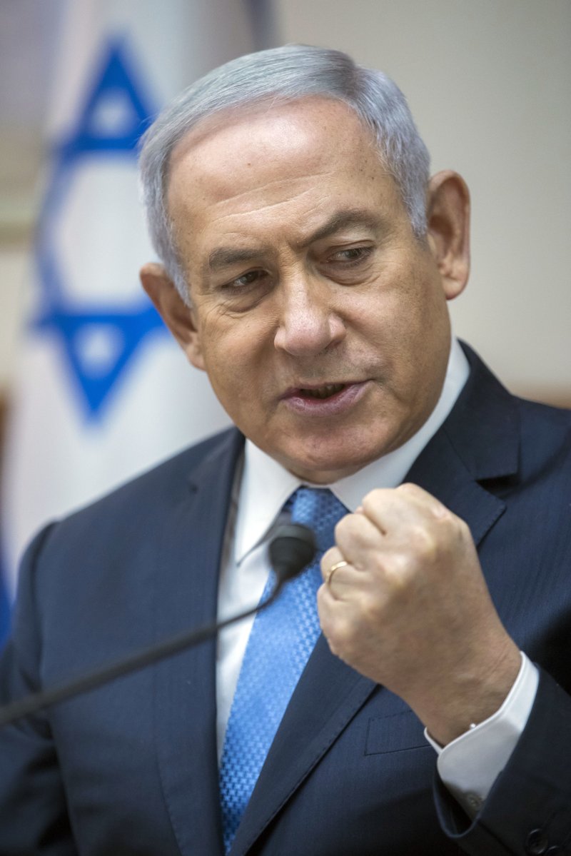 Israeli Prime Minister Benjamin Netanyahu chairs the weekly cabinet meeting in Jerusalem, Sunday, May 6, 2018. Netanyahu said Sunday that Iran is supplying advanced weapons to Syria that pose a danger to Israel and that it's better to confront Tehran sooner rather than later. (Jim Hollander/Pool Photo via AP)