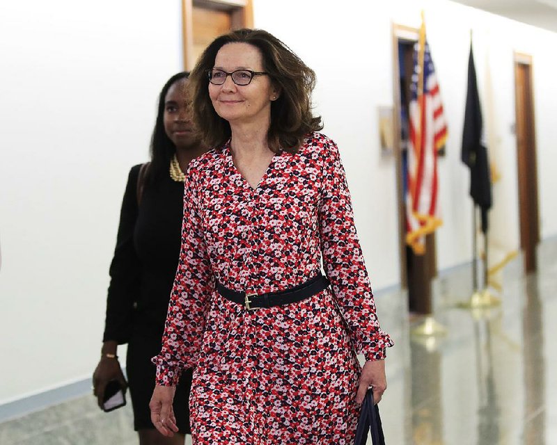 CIA Director nominee Gina Haspel walks to meetings on Capitol Hill in Washington, Monday, May 7, 2018. 