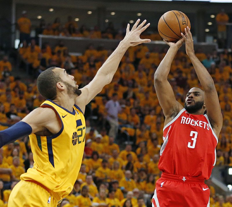 The Associated Press MID-RANGE: Houston guard Chris Paul (3) shoots over Utah Jazz center Rudy Gobert (27) Sunday in the first half of the Rockets' 100-87 win in Salt Lake City to take a 3-1 lead in the second round of the NBA playoffs.