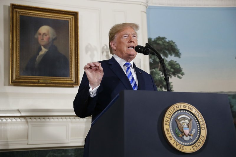 President Donald Trump delivers a statement on the Iran nuclear deal from the Diplomatic Reception Room of the White House on Tuesday, May 8, 2018, in Washington.