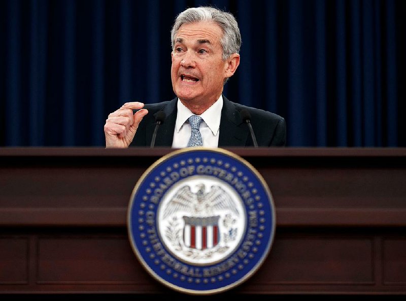 In this March 21, 2018, file photo, Federal Reserve Chairman Jerome Powell speaks following the Federal Open Market Committee meeting in Washington.