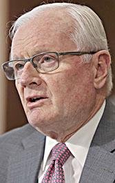 Walter Higgins, Chief Executive Office, Puerto Rico Electric Power Authority, center, speaks at the Senate Committee on Energy and Natural Resources on Capitol Hill in Washington, Tuesday, May 8, 2018.