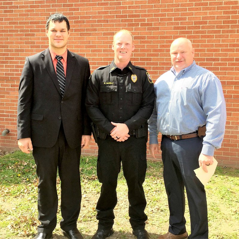 Submitted Photo Sergeant Chris Kelley and police chief Chuck Skaggs pose with Officer Bradley McNelly (center), who has recently returned to work at the Gravette Police Department. Officer McNelly graduated from the Arkansas Law Enforcement Training Academy April 20 after 13 weeks of training.