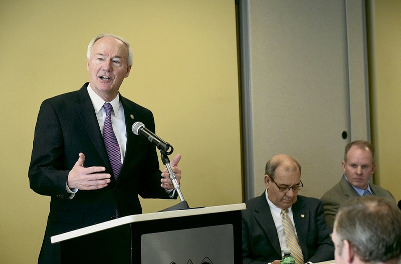 FILE — Gov. Asa Hutchinson delivers remarks in January at the North American Free Trade Agreement summit in Rogers. NWA Democrat-Gazette/FLIP PUTTHOFF