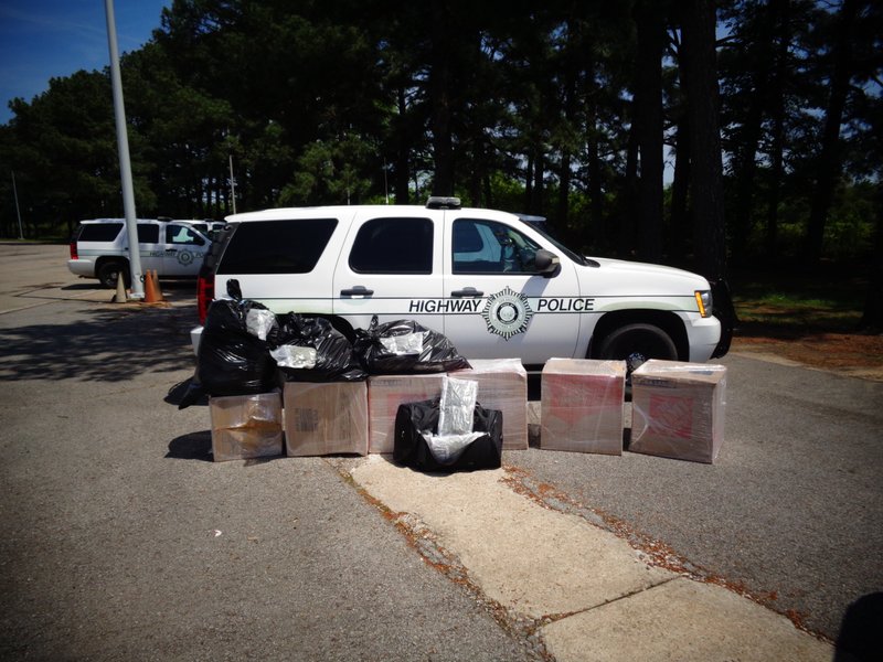 Authorities seize 200 pounds of marijuana after stopping a tractor-trailer Sunday, May, 6, 2018, at the Alma weigh station.