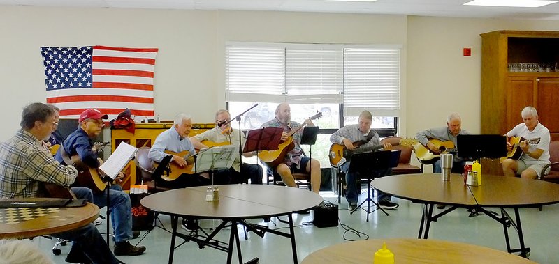 The Weekly Vista/LYNN ATKINS Members of the Bella Vista Strings -- a group that gets together once a week to play all kinds of stringed instruments -- moved their jam session to Concordia last week. They played in the dining room of the nursing home.