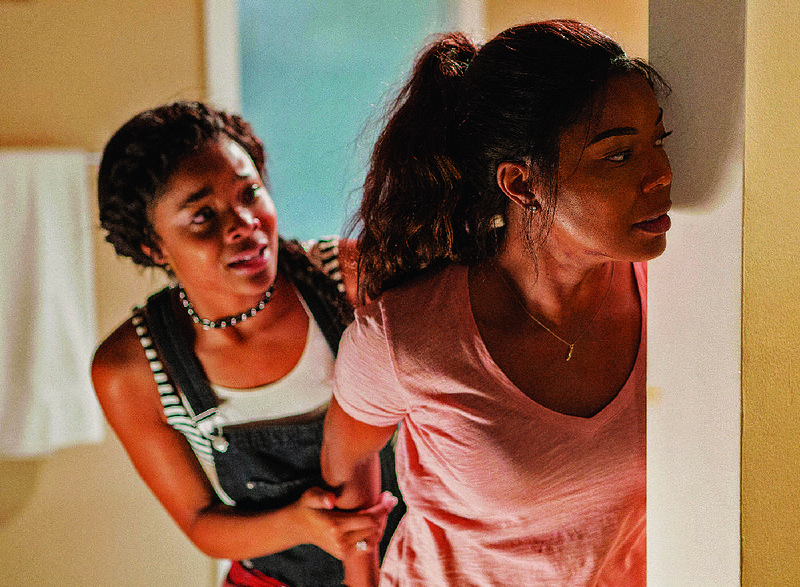 Jasmine (Ajiona Alexus) and her mother Shaun (Gabrielle Union) have to use all their resources to survive a home invasion in James McTeigue’s thriller Breaking In. 
