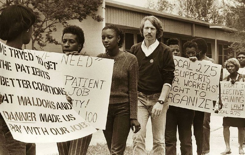 Wade Rathke marches alongside health care workers in this still from Nick Taylor’s documentary The Organizer. Rathke will be present at Saturday’s free screening of the fi lm at the Central Arkansas Library System’s Ron Robinson Theater. 
