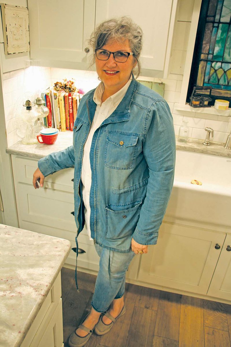 Cheryl Farmer stands in the kitchen at her home in Benton. She said one of the things she is most known for is her cooking. Cheryl’s mom, Ann Wilson, died on April 21 after an 11-year battle with Alzheimer’s disease. For the reception, after the funeral Cheryl made her mom’s chicken spaghetti, and she said people were surprised because it is so different from other recipes.