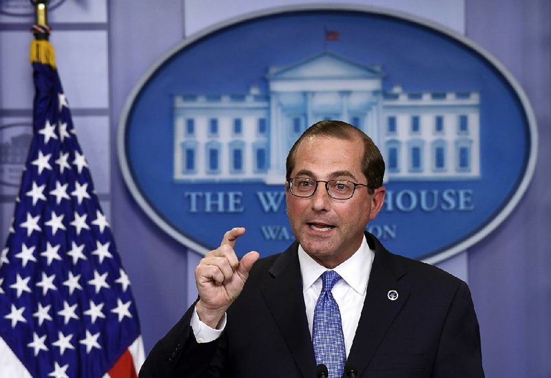 Health and Human Services Secretary Alex Azar discusses a government plan to lower the cost of prescription drugs during a briefing Friday at the White House. 
