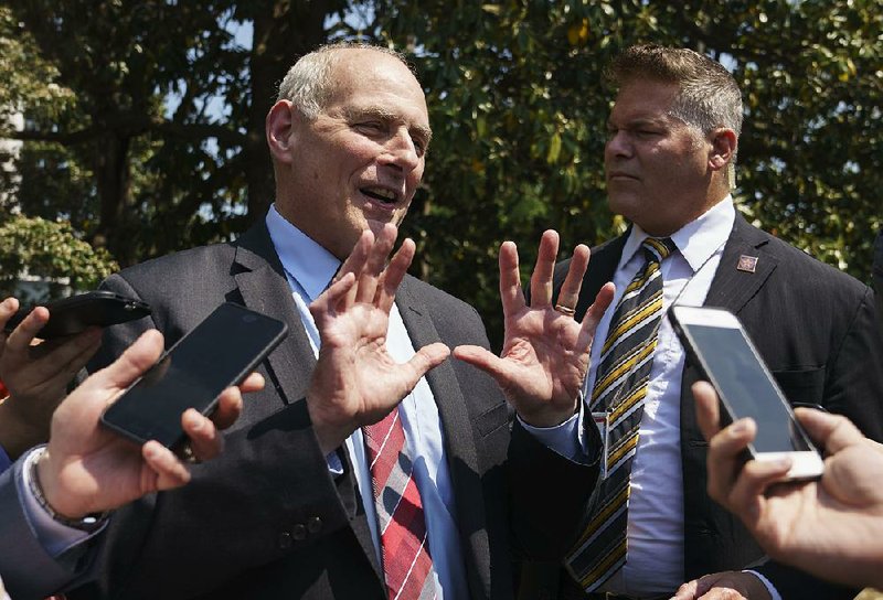 White House Chief of Staff John Kelly speaks to reporters Friday in the Rose Garden, where he corrected some of his remarks on President Donald Trump’s feelings about the Russia investigation. 
