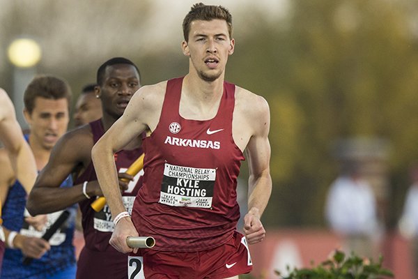 Arkansas' Kyle Hosting runs the first leg of the 4x800 meter relay during the National Relay Championships on Saturday, April 28, 2018, in Fayetteville. 